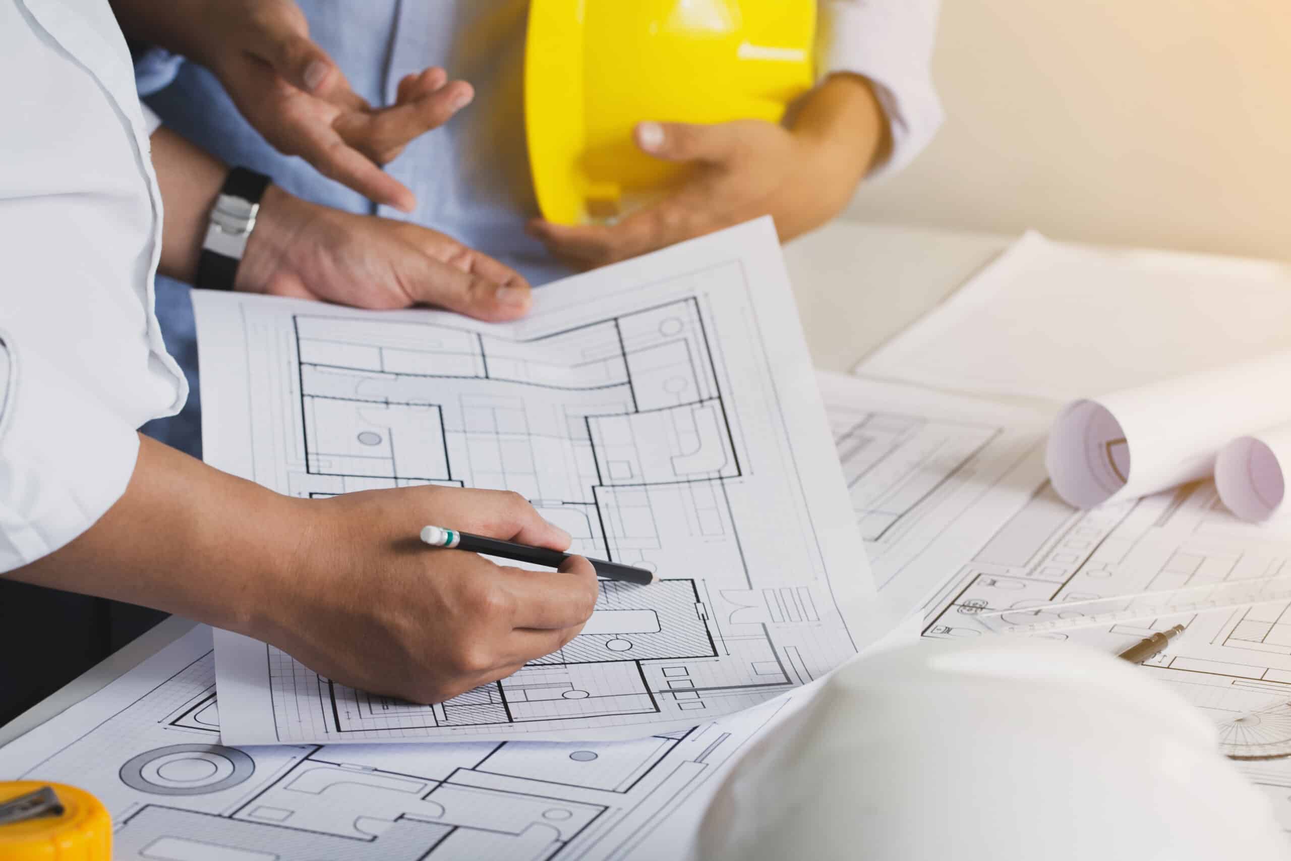 Team discussion with construction on site work.engineer meeting